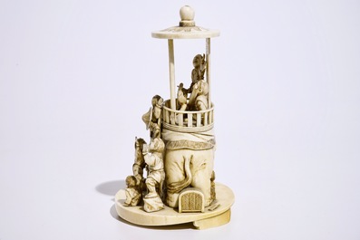 A fine Japanese ivory okimono of boys playing with an elephant, Meiji, 19th C., signed