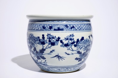 A blue and white Chinese fishbowl with birds among flowers, 19th C.