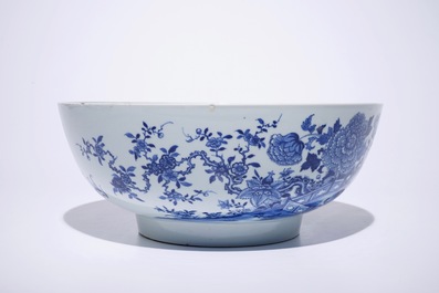 A large Chinese blue and white bowl with birds among blossoming flowers, Qianlong