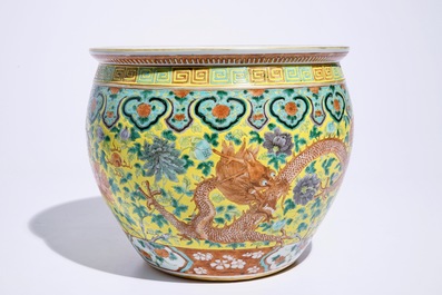 A small Chinese famille verte fish bowl with dragons on a yellow ground, 19th C.