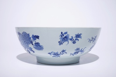 A large Chinese blue and white bowl with birds among blossoming flowers, Qianlong