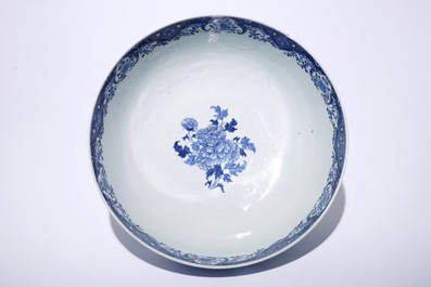 A large Chinese blue and white bowl with birds among blossoming flowers, Qianlong