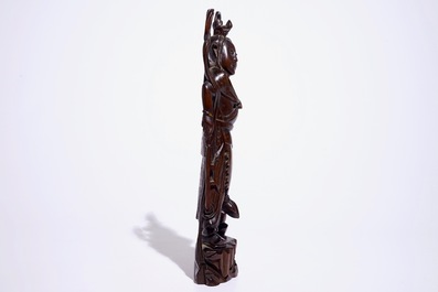 A large Chinese carved and inlaid wood figure, 19/20th C.