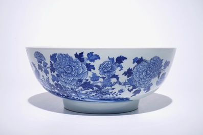A large Chinese blue and white bowl with birds among blossoming flowers, Qianlong