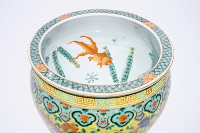 A small Chinese famille verte fish bowl with dragons on a yellow ground, 19th C.