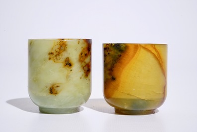 Two Chinese mottled jade wine cups, 20th C.