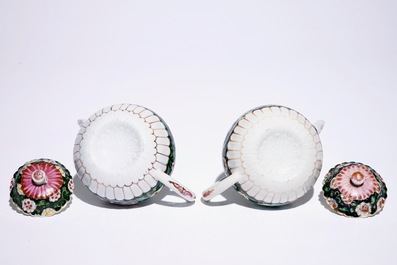 A pair of Chinese famille noire teapots on stand, Yongzheng