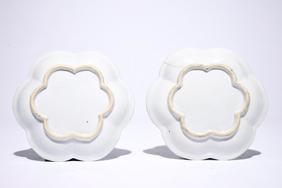 A pair of Chinese famille noire teapots on stand, Yongzheng