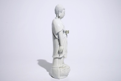 A Chinese Dehua blanc de Chine model of a standing Buddha, impressed mark on the back, Kangxi
