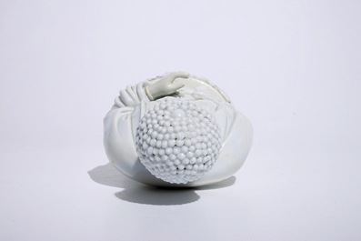 A Chinese Dehua blanc de Chine model of a standing Buddha, impressed mark on the back, Kangxi
