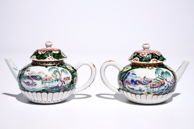 A pair of Chinese famille noire teapots on stand, Yongzheng