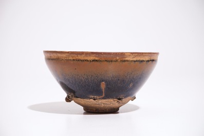 A Chinese Jian black and brown glazed hare's fur tea bowl, Song