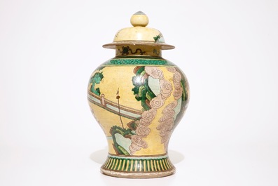 A Chinese famille verte on yellow ground baluster jar and cover, 19th C.