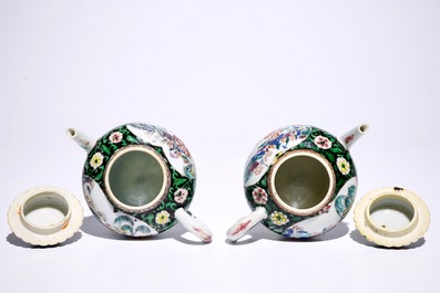 A pair of Chinese famille noire teapots on stand, Yongzheng
