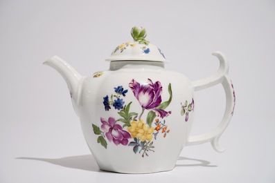 A German porcelain teapot and cover with floral design, 18/19th C.
