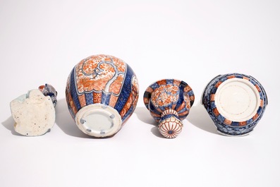 A Japanese Imari vase on stand and a Kutani model of a bijin, Meiji, 19th C.