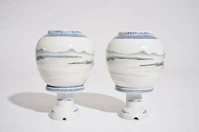 A pair of Chinese famille rose eggshell lanterns on stands, Republic, 20th C.