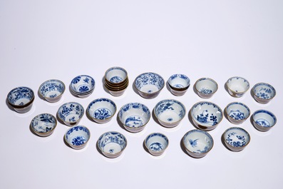 A large collection of Chinese blue and white on capucin brown ground cups and saucers, Kangxi/Qianlong