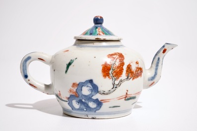 A Chinese wucai teapot and cover with figures in a garden, 19th C.
