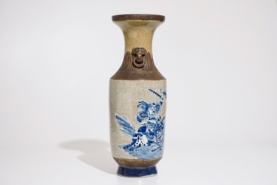 A Chinese Nanking blue and white on crackle ground vase, 19th C.