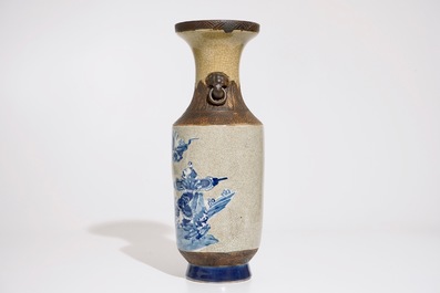 A Chinese Nanking blue and white on crackle ground vase, 19th C.