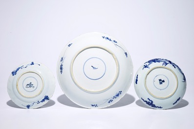 A Chinese blue and white kendi, Ming, Wanli and three blue and white plates, Kangxi