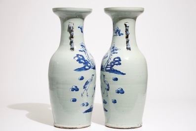 A pair of Chinese vases in blue and white on celadon ground with cranes, 19th C.