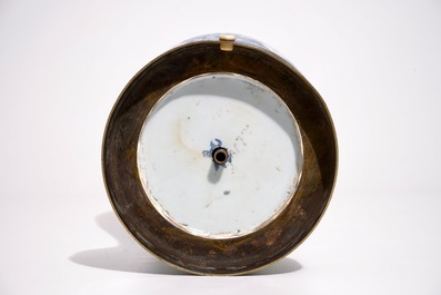 A Chinese blue and white on carved celadon-glazed ground vase, mounted as lamp, Kangxi