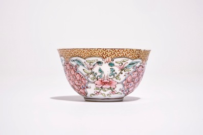 A Chinese famille rose cup and saucer with floral design, Yongzheng