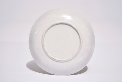 A Chinese famille rose cup and saucer with floral design, Yongzheng