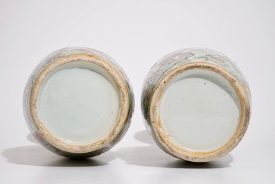 A pair of Chinese Canton famille rose on celadon ground vases, 19th C.