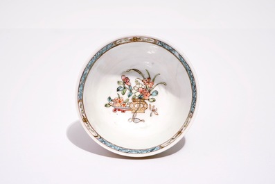 A Chinese famille rose cup and saucer with floral design, Yongzheng