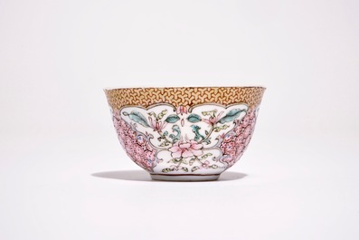 A Chinese famille rose cup and saucer with floral design, Yongzheng