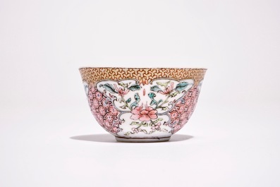A Chinese famille rose cup and saucer with floral design, Yongzheng