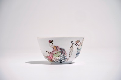 A Chinese famille rose cup and saucer with a lady and a boy, Yongzheng