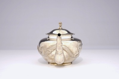 An inscribed Chinese silver teapot with dragon design, ca. 1936