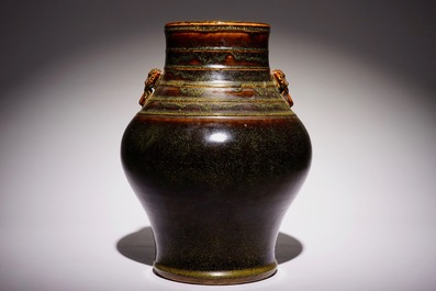 A Chinese monochrome tea-dust-glazed hu vase, Qianlong mark, 19th C.