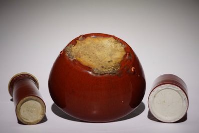 A Chinese monochrome sang-de-boeuf-glazed brush pot, a beaker vase and a bowl, 19/20th C.