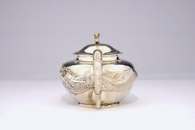 An inscribed Chinese silver teapot with dragon design, ca. 1936