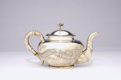 An inscribed Chinese silver teapot with dragon design, ca. 1936