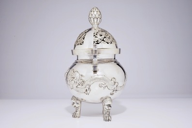 A Chinese silver tripod incense burner and cover with dragons, 19th C.