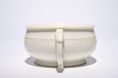A round Chinese Dehua blanc de Chine censer with moulded and underglaze decoration, 19th C.