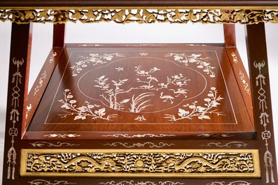 A Chinese parcel-gilt and sculpted wood table with bone inlay, 20th C.