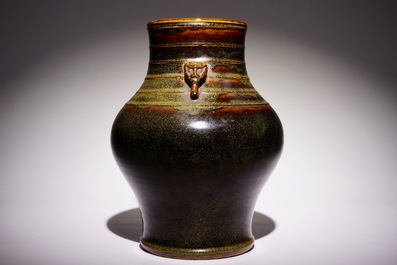 A Chinese monochrome tea-dust-glazed hu vase, Qianlong mark, 19th C.