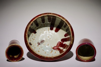 A Chinese monochrome sang-de-boeuf-glazed brush pot, a beaker vase and a bowl, 19/20th C.