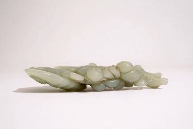 A Chinese pale celadon jade group of boys on a lingzhi, 19th C.