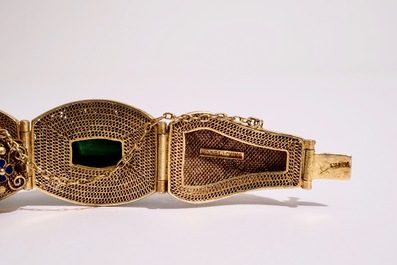 Un ensemble de bijoux en argent dor&eacute; et &eacute;maill&eacute;, ivoire peint et malachite, d&eacute;but du 20&egrave;me