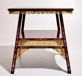 A Chinese parcel-gilt and sculpted wood table with bone inlay, 20th C.