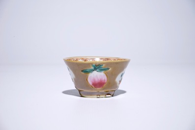 Nine Chinese famille rose on capucin brown ground cups and saucers, Qianlong
