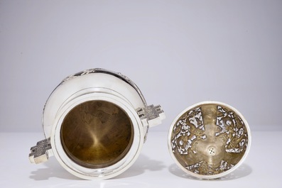 A Chinese silver tripod incense burner and cover with dragons, 19th C.